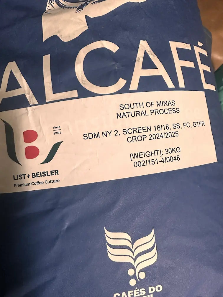 Full sack of unroasted green coffee beans, specialty-grade raw beans ideal for home roasting or wholesale supply.